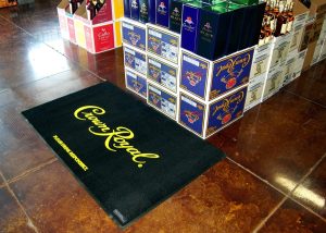 Flocked Olefin in Use - Showcase of the versatile indoor/covered outdoor entrance mat, highlighting its 3-dimensional raised nylon flock imprint