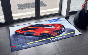 Custom indoor entrance mat inside business lobby.